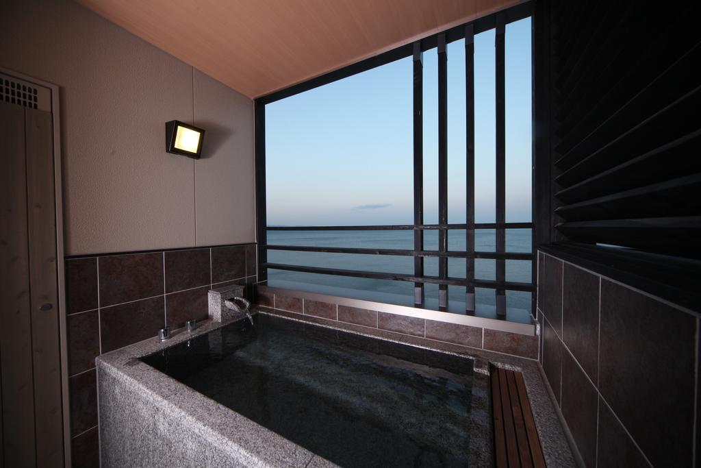 Amane Resort Seikai Beppu Cameră foto A private onsen bath